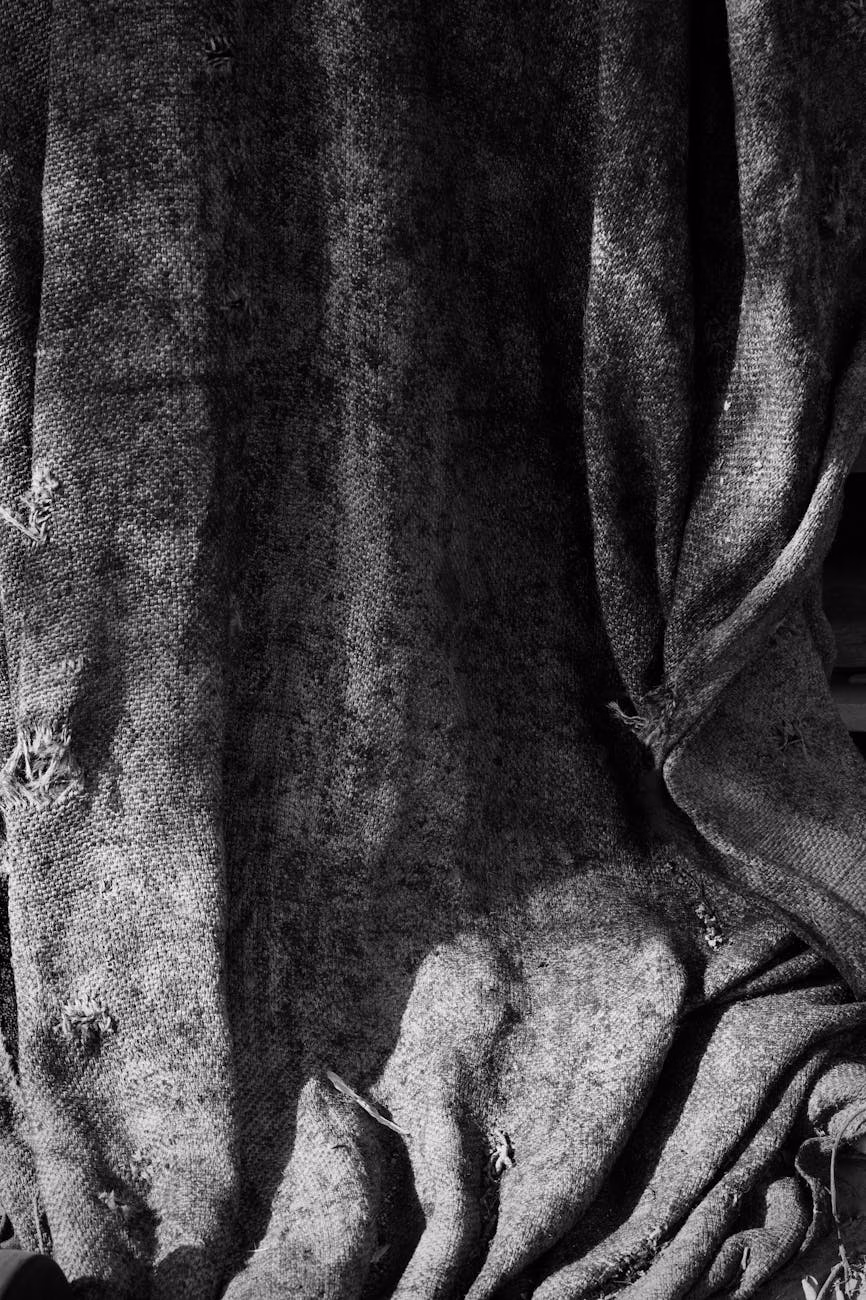 black and white texture of worn fabric